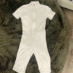 Here is a New White romper from FashionNova, never worn and recently bought